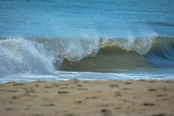 Crashing wave along the beach in the Outer Banks of North Carolina