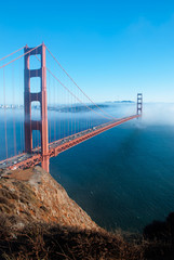 San Francisco Golden Gate bridge on foggy day dramatic evening light view from Marin Headland