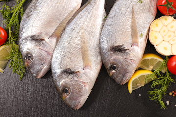 raw dorado fish and spices