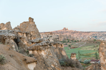 beautiful tranquil landscape with rock formations in famous cappadocia, turkey