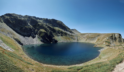 Fototapeta na wymiar The Eye ( Okoto ) lake. Part of the seven rila lakes. Deepest cirque lake in Bulgaria
