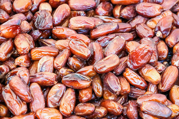 Organic dates dried fruit for the holiday table. Background. Close up