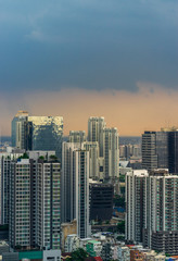 Fototapeta na wymiar uban cityscape building with storm sky cloud