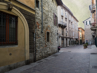 Fototapeta na wymiar beautiful stone houses in Como downtown.Lombardy, Italy