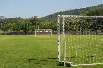 Soccer field and goal in mountain