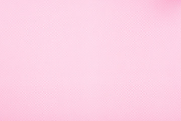 Texture of polka dot pattern on pink background