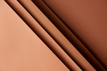 Pattern of overlapping paper sheets in brown tones