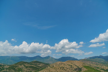 Spring morning at mountains and clouds