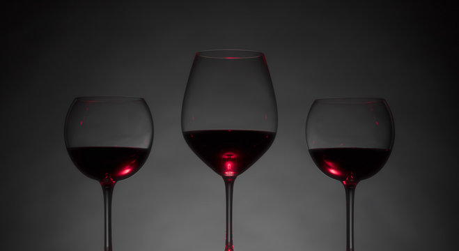 Glasses of red wine .