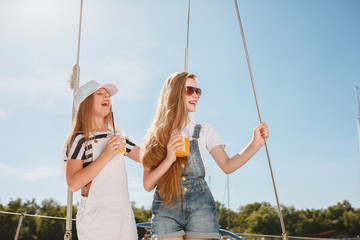 The children on board of sea yacht