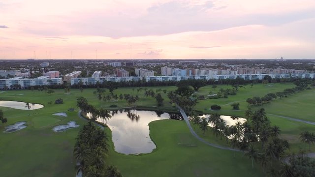 Aerial drone footage golf course and condominiums