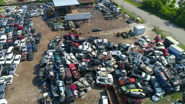 Aerial drone video automotive car junk yard 4k 60p