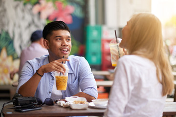 Enjoying smoothie and conversation