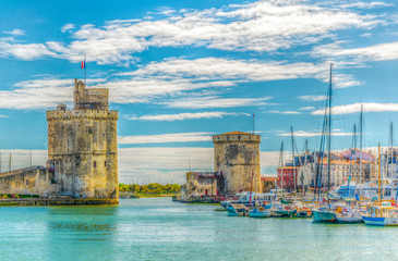 Port of La rochelle guarded by tour de la chaine and tour Saint Nicholas, France