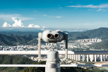 Binocular on viewpoint with cityscape