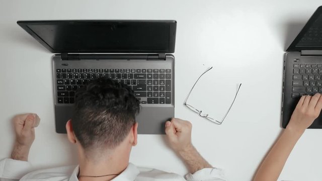 Sales manager is very nervous of working, top view.