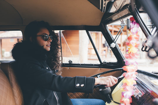 Teen woman inside a van