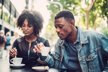 Young happy black couple outdoors