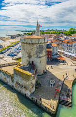 Seaside of La Rochelle dominated by Tour de la Lanterne and tour de la chaine, France