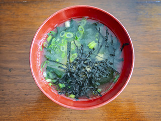 Top view of Japanese miso soup with tofu and nori(seaweed).
