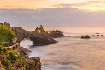 Sunset view of Rocher de la Vierge in Biarritz, France