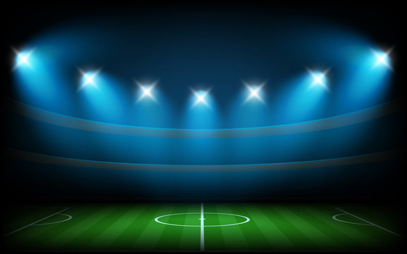 Soccer arena illuminated with spot lights
