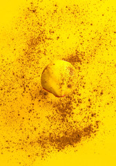 Obraz premium colored glazed donut falling or flying in motion against yellow pastel background with chocolate texture. Concept of food, colorful breakfast. Macro concept. closeup, copy space,vertical shot