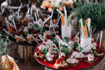 Catering for party on a table with flowers