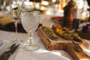 Beautiful cutlery on the wedding table. Lunch devices