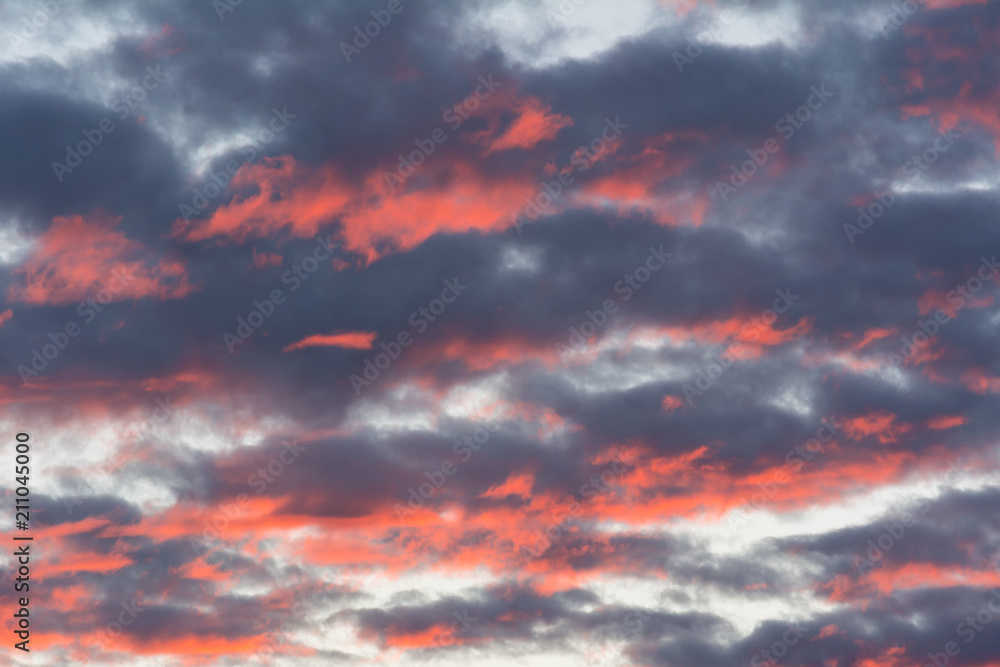 Wall mural background of the evening sky and amazing clouds.