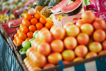 Fresh organic vegetables and fruits on farmer market in Paris, France