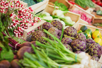 Fresh organic vegetables and fruits on farmer market in Paris, France