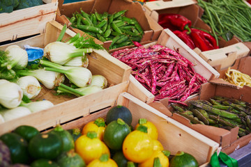 Fresh organic vegetables and fruits on farmer market in Paris, France