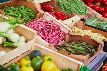 Fresh organic vegetables and fruits on farmer market in Paris, France