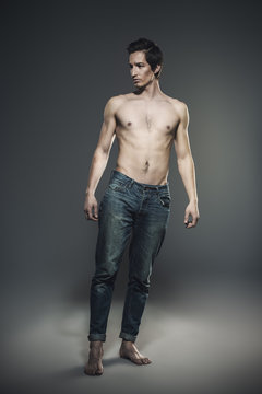 athletic man in jeans