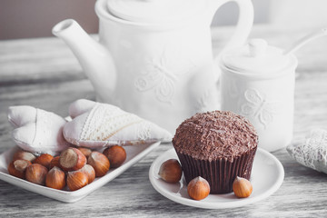 Teapot, cupcakes and different decorations