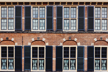 Obraz premium Facade of the ancient building made of red brick