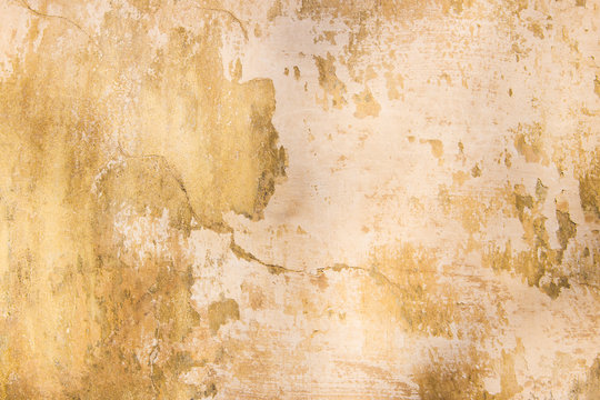 Old vintage grungy plaster painted wall texture background
