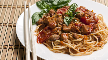 Spaghetti in tomato sauce with chicken