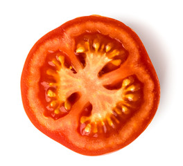 Half red tomato on a white isolated. The view from the top.