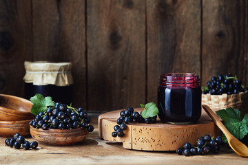 Freshly picked home grown blackcurrants and homemade blackcurrant jam