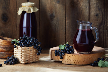 Freshly picked home grown blackcurrants and homemade blackcurrant juice