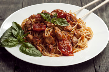 Spaghetti in tomato sauce with chicken