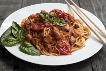 Spaghetti in tomato sauce with chicken