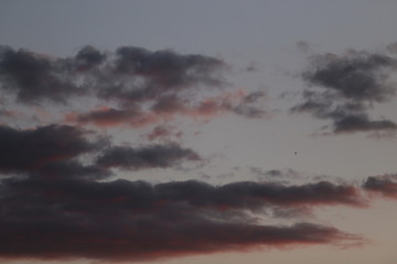 Obraz premium Dark-red clouds in the evening.