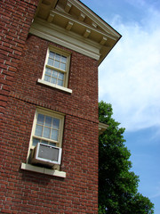 brick building with air conditioner