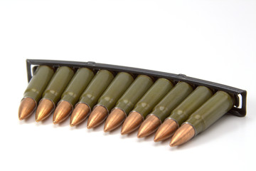 clip with cartridges 7,62 on 39 for a self-loading carbine of Simonov on white background close-up