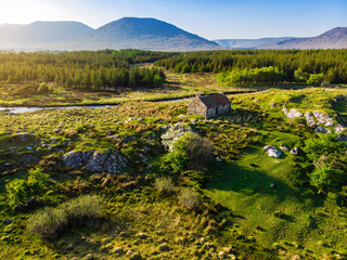 Beautiful sunset view of Connemara. Scenic Irish countryside landscape with magnificent mountains...