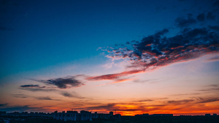 Fototapeta na wymiar Colorful dramatic sunset, beautiful evening blue and red orange cloudscape