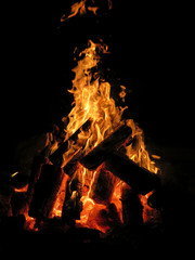 Dramatic fire flames in a campfire pit